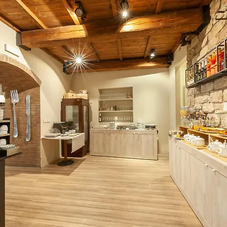 Отель Asisium Boutique Ассизи